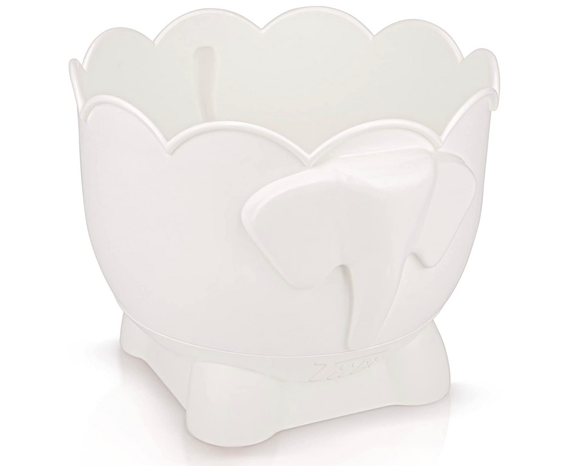The Bath Buddy organizer on a plain white background: a scalloped-rim drum with an elephant face moulded into the front, seated on its matching tray
