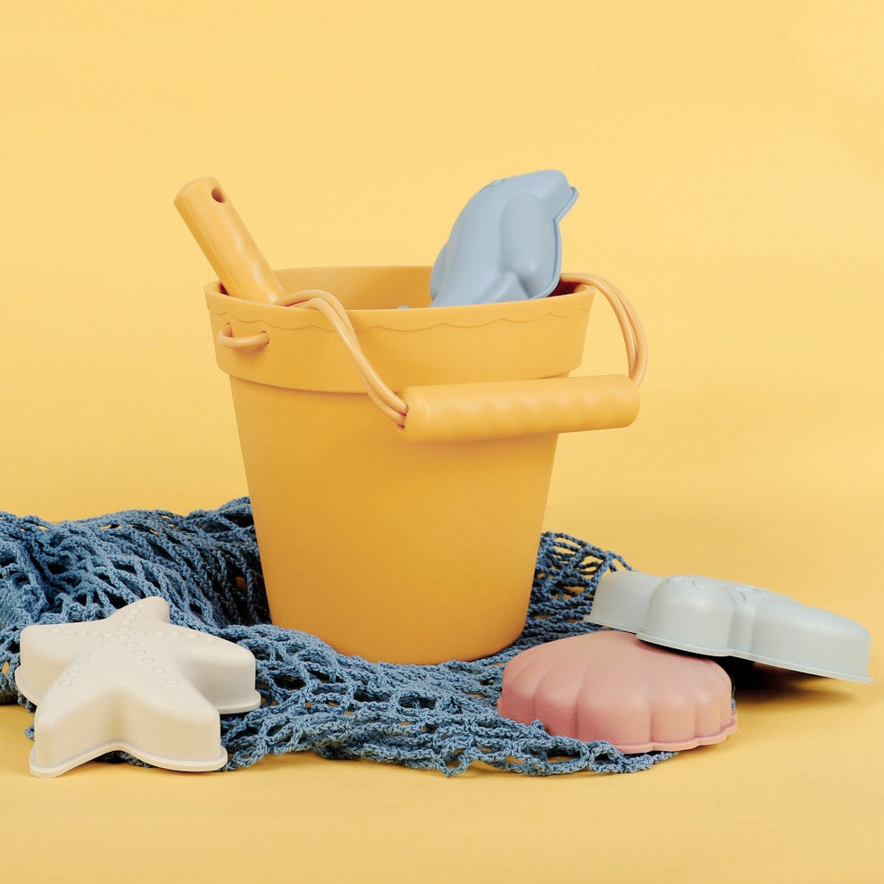 Beach Bucket Set molds laid out side by side.